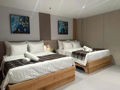Habitación Cuádruple — Leonora Hotel